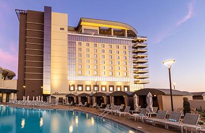 An image of the exterior and pool area of the Gila River Resorts & Casinos—Wild Horse Pass, venue for the 2026 Lab Manager Leadership Summit
