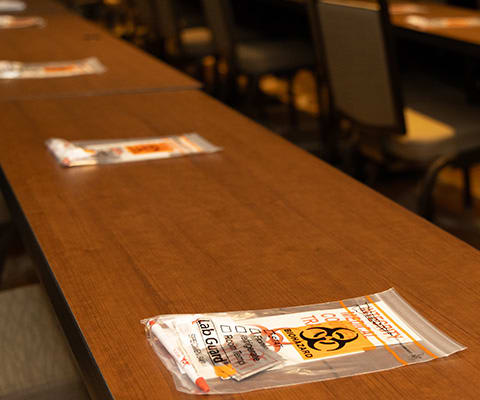 A photo of a sponsored seat drop at an attendees table at the Lab Manager Leadership Summit
