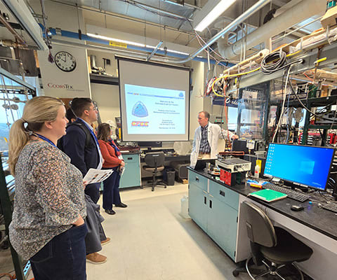 An image of Lab Manager Leadership Summit attendees on an exclusive behind-the-scenes lab tour 