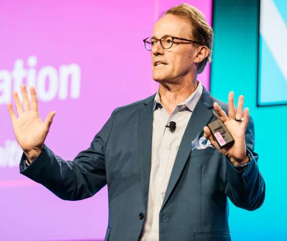 A Keynote speaker on stage at Lending Tech Live