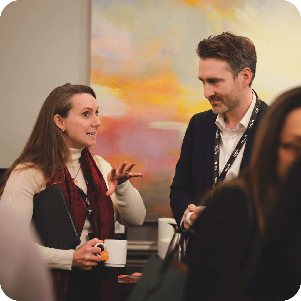 Senior executives shaking hands at the HFM Billion Dollar  Leaders Summit 