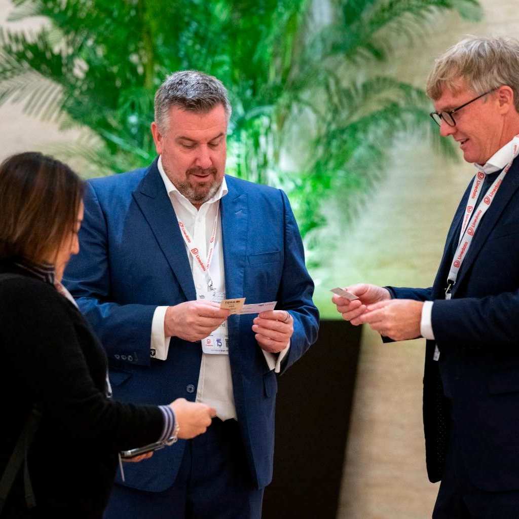 Sponsors exchanging visiting cards at the With Intelligence Hedge Fund COO Summit | APAC