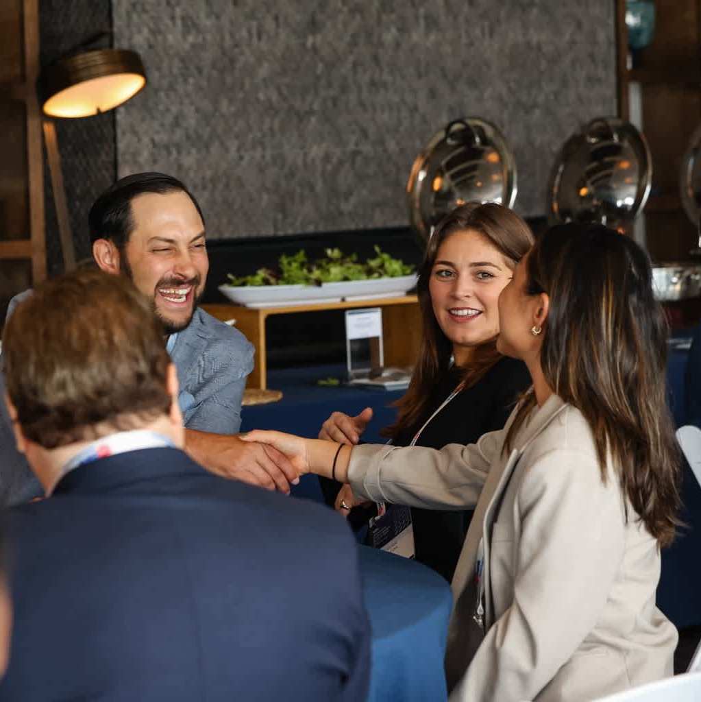 Sponsors networking over dinner party at the Hedge Fund Billion Dollar Leaders Summit