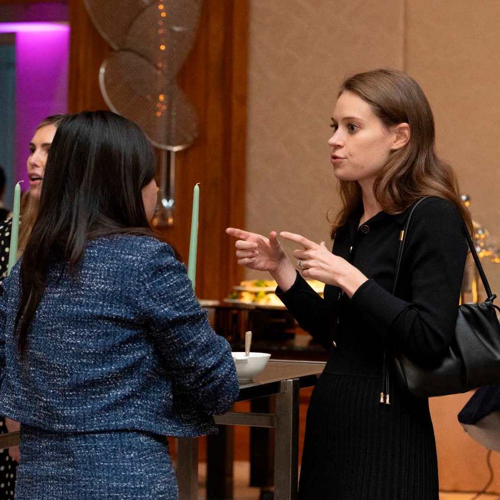 Attendees having a conversation with the sponsors of Women’s Private Capital Summit Canada
