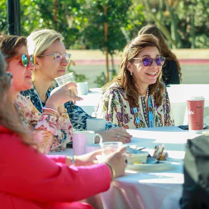Femlae leaders having a conversation at the Women's Private Equity Leadership Breakfast Toronto