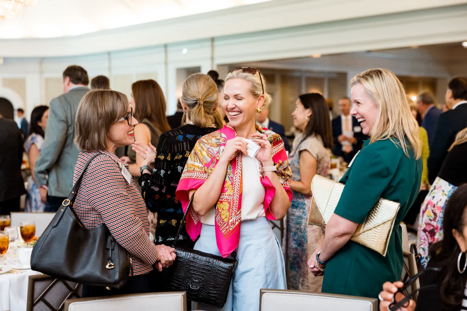 Luncheon Attendees Laughing and Talking