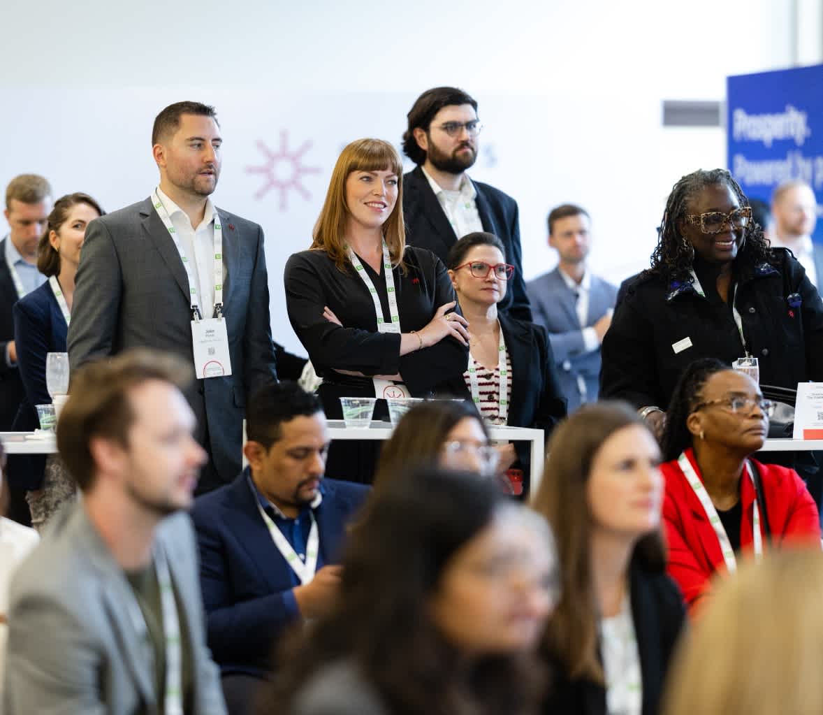 Photo of a group of people listening to a breakout session at The 2026 SUMMIT.